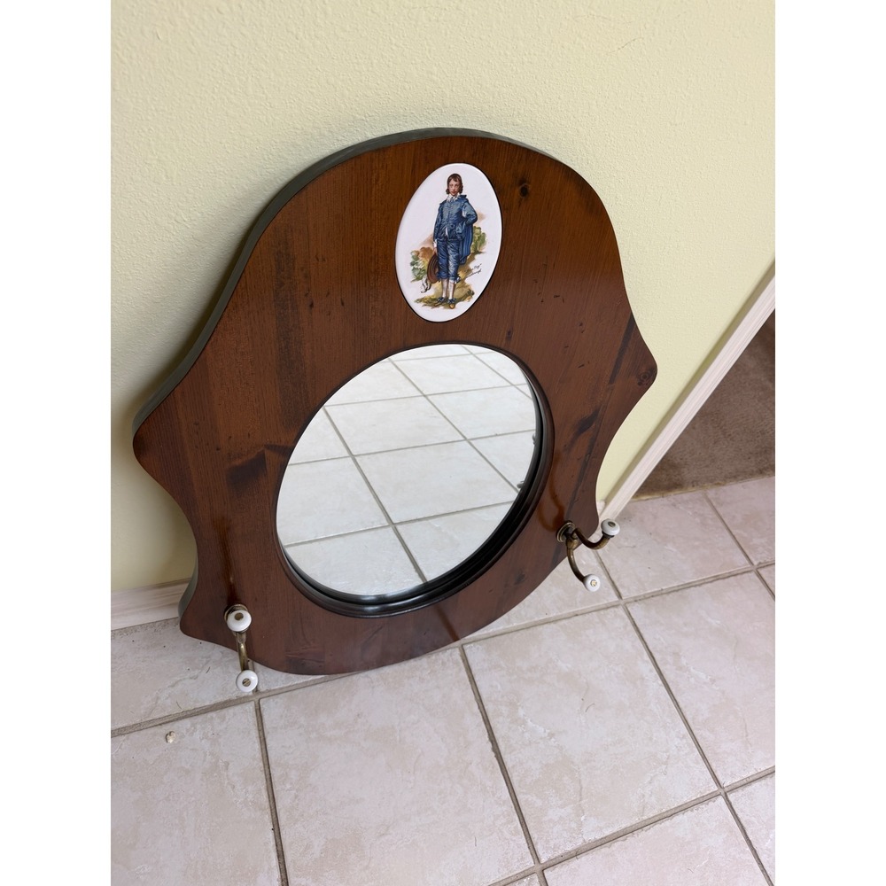 Vintage Wood Wall Mirror with The Blue Boy Ceramic Cameo and Brass Coat Hooks